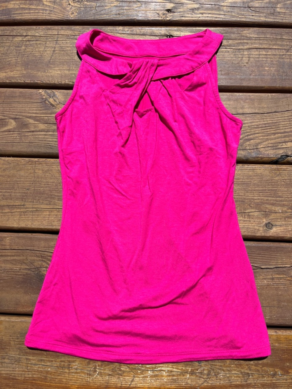 Bright pink high neck tank top with cutout details